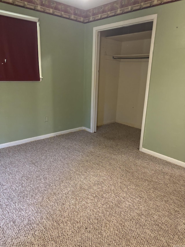 513 Joyce, Searcy, AR 72143 - unfurnished bedroom featuring carpet and a closet