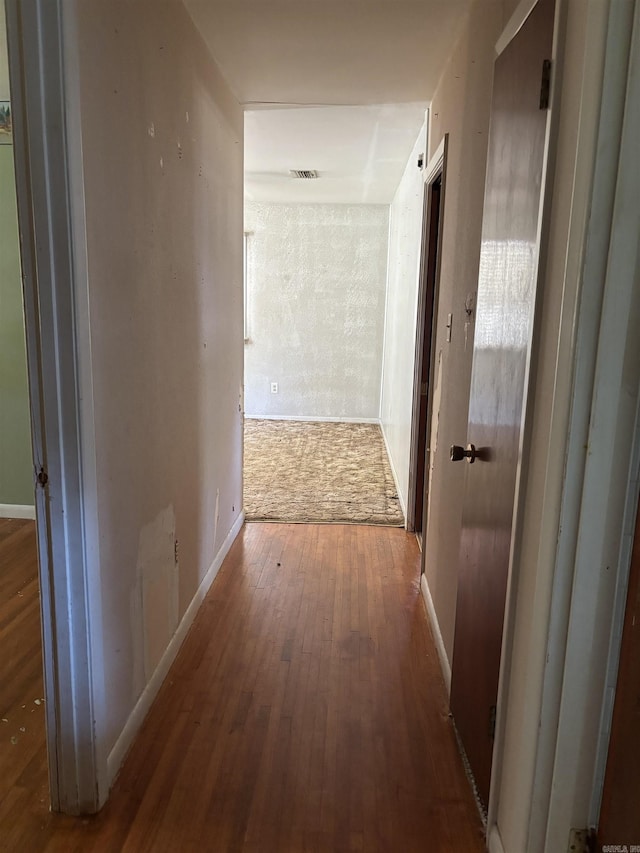 513 Joyce, Searcy, AR 72143 - corridor with hardwood / wood-style flooring and baseboards