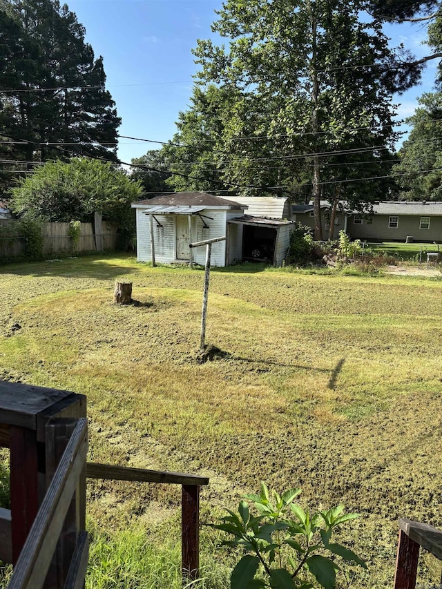 513 Joyce, Searcy, AR 72143 - view of yard featuring a storage unit