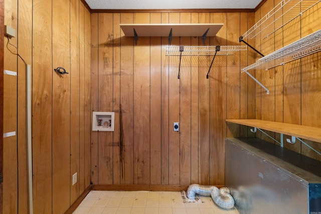 7025 Windsong, North Little Rock, AR 72113 - laundry area featuring hookup for an electric dryer, hookup for a washing machine, and wooden walls