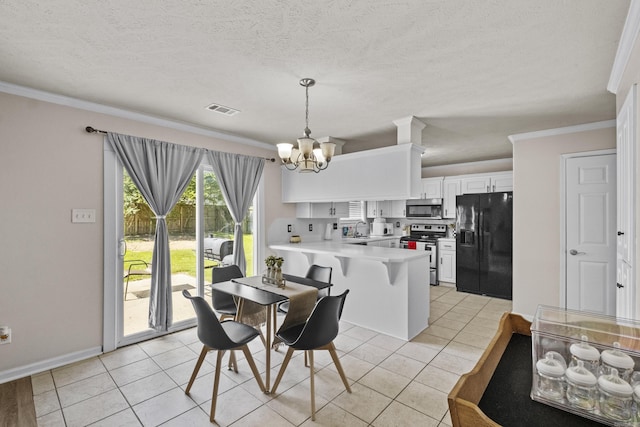 19 Mustang, Cabot, AR 72023 - dining space with light tile patterned floors, a chandelier, and ornamental molding