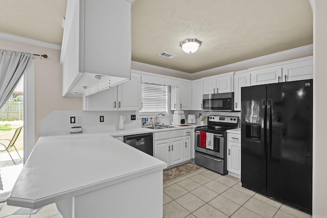 19 Mustang, Cabot, AR 72023 - kitchen with black appliances, a peninsula, crown molding, white cabinets, and light tile patterned floors