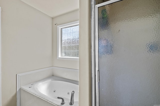 19 Mustang, Cabot, AR 72023 - bathroom featuring a shower stall and a whirlpool tub