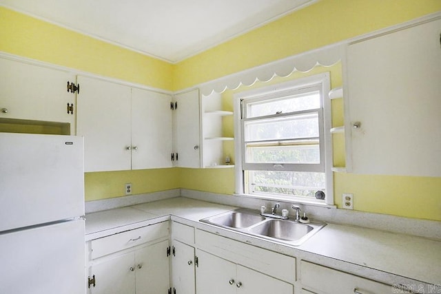 1810 N Mississippi, Little Rock, AR 72227 - kitchen featuring freestanding refrigerator, open shelves, white cabinets, and light countertops