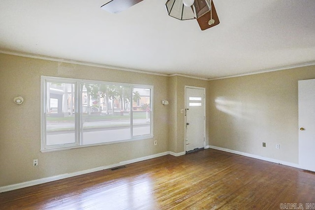 1810 N Mississippi, Little Rock, AR 72227 - entryway with ornamental molding, wood finished floors, and ceiling fan