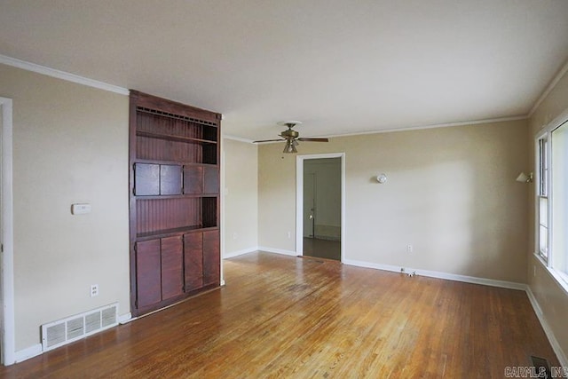 1810 N Mississippi, Little Rock, AR 72227 - empty room with wood finished floors, a ceiling fan, and crown molding
