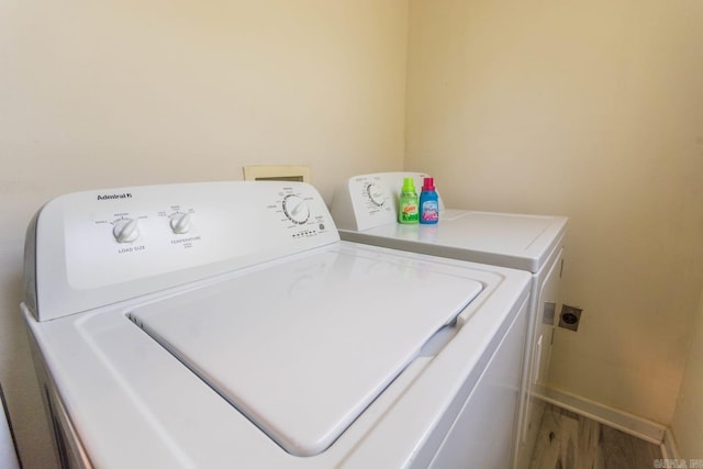 4624 W 29th St, Little Rock, AR 72204 - washroom with separate washer and dryer and wood finished floors