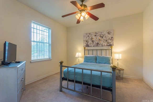 4624 W 29th St, Little Rock, AR 72204 - bedroom featuring light colored carpet and a ceiling fan