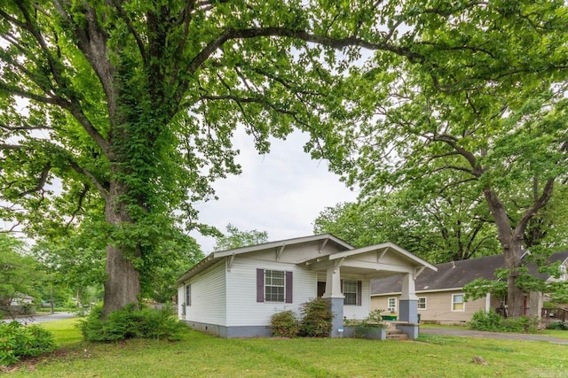 4624 W 29th St, Little Rock, AR 72204 - view of front of home featuring a front lawn and covered porch