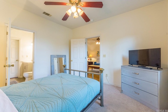 4624 W 29th St, Little Rock, AR 72204 - bedroom with ensuite bathroom, light carpet, and a ceiling fan