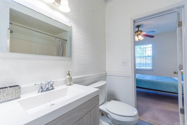 4624 W 29th St, Little Rock, AR 72204 - ensuite bathroom with a textured wall, vanity, and a ceiling fan
