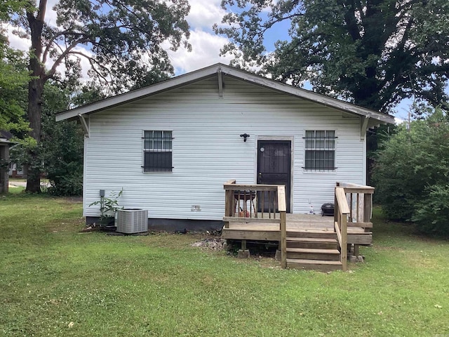 4624 W 29th St, Little Rock, AR 72204 - back of house with a wooden deck and a lawn