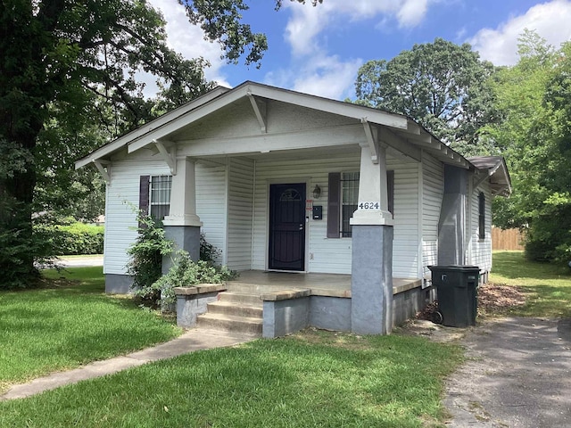 4624 W 29th St, Little Rock, AR 72204 - bungalow-style house with a porch and a front lawn
