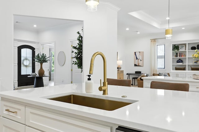 153 Caurel Cir, Little Rock, AR 72223 - kitchen featuring open floor plan, hanging light fixtures, crown molding, recessed lighting, and white cabinets