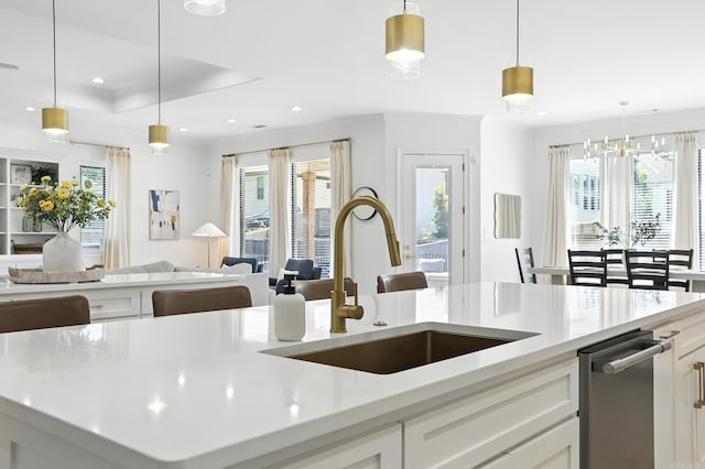 153 Caurel Cir, Little Rock, AR 72223 - kitchen with open floor plan, light countertops, healthy amount of natural light, white cabinetry, and recessed lighting