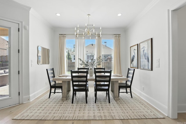 153 Caurel Cir, Little Rock, AR 72223 - dining area featuring a chandelier, wood finished floors, ornamental molding, and recessed lighting