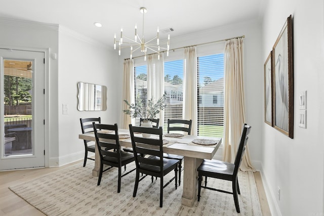 153 Caurel Cir, Little Rock, AR 72223 - dining room featuring a chandelier, light wood finished floors, ornamental molding, and recessed lighting