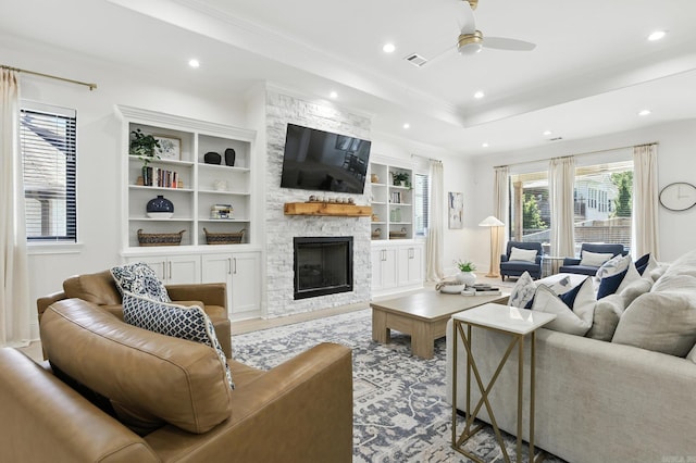 153 Caurel Cir, Little Rock, AR 72223 - living area featuring ornamental molding, recessed lighting, a ceiling fan, a stone fireplace, and built in features