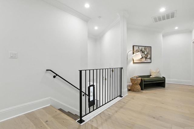 153 Caurel Cir, Little Rock, AR 72223 - stairway with ornamental molding, wood finished floors, and recessed lighting
