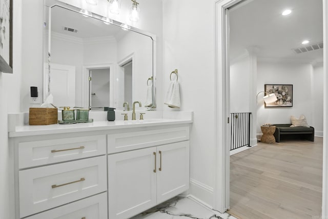 153 Caurel Cir, Little Rock, AR 72223 - bathroom featuring ornamental molding, vanity, and recessed lighting