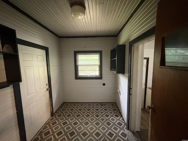 100 E Lincoln Ave, Searcy, AR 72143 - laundry area with tile patterned floors and wood ceiling