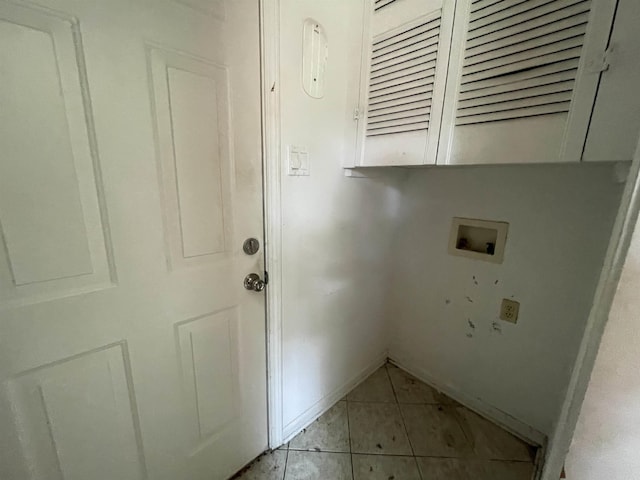 3806 Winterbrook Dr, Benton, AR 72015 - laundry area featuring cabinet space, washer hookup, and light tile patterned floors