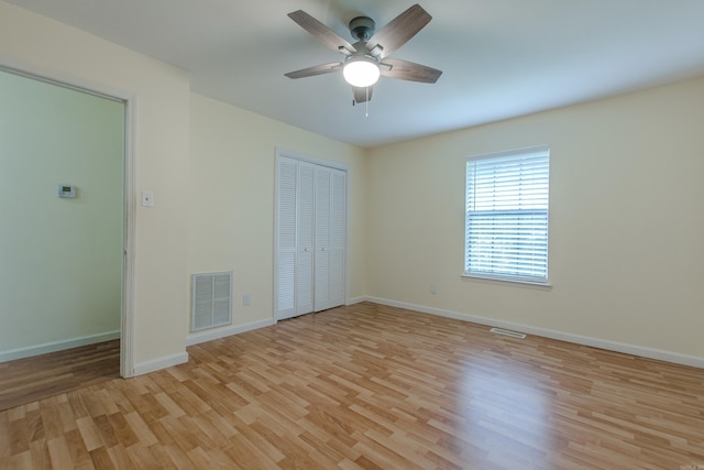 81 Stoneledge Dr, Maumelle, AR 72113 - unfurnished bedroom featuring light wood-type flooring, a closet, and a ceiling fan