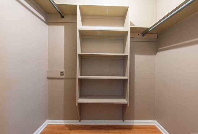 81 Stoneledge Dr, Maumelle, AR 72113 - walk in closet with wood finished floors
