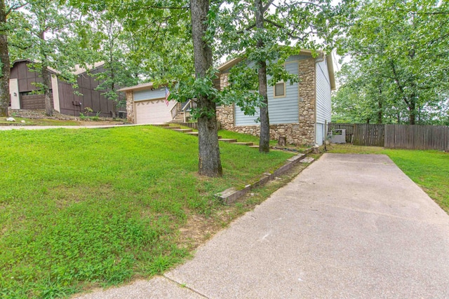81 Stoneledge Dr, Maumelle, AR 72113 - view of front facade featuring stone siding and concrete driveway