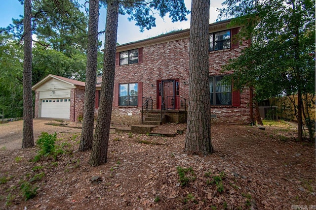 12605 Janelle Ct, Little Rock, AR 72205 - view of front facade with brick siding, a garage, and driveway
