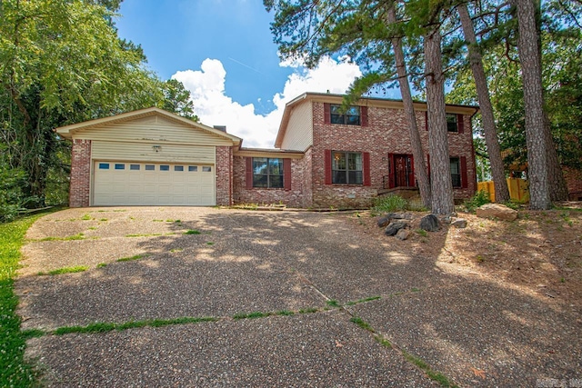 12605 Janelle Ct, Little Rock, AR 72205 - view of front of property with brick siding, driveway, and a garage