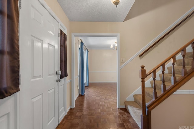 12605 Janelle Ct, Little Rock, AR 72205 - entryway with a textured ceiling and stairway