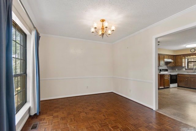 12605 Janelle Ct, Little Rock, AR 72205 - empty room featuring a chandelier, a textured ceiling, and crown molding