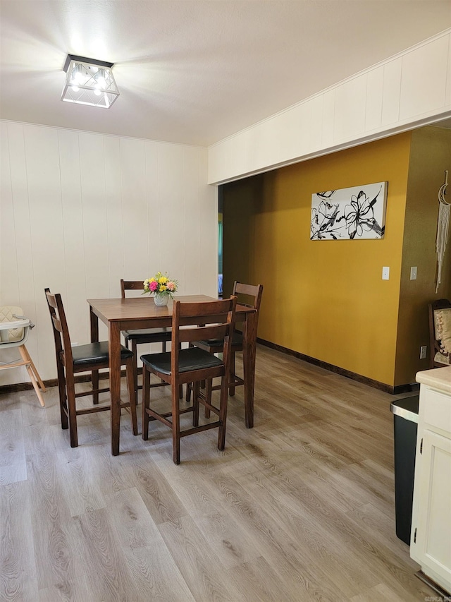 1209 Cole Ave, Mena, AR 71953 - dining space with light wood finished floors and baseboards