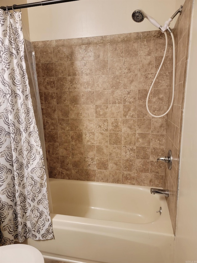 1209 Cole Ave, Mena, AR 71953 - full bathroom featuring shower / bath combo with shower curtain and toilet
