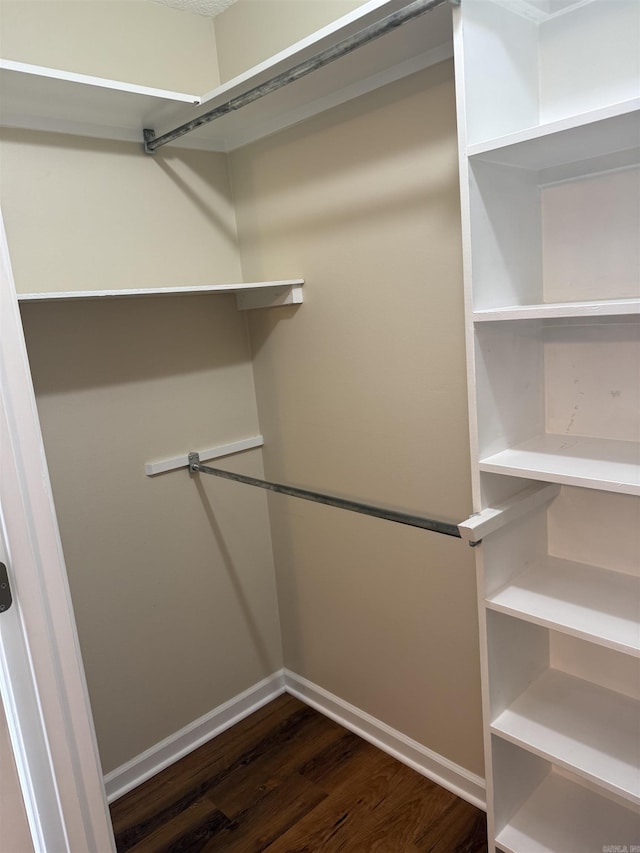 609 Scenic Vly, Heber Springs, AR 72543 - walk in closet with dark wood-style floors