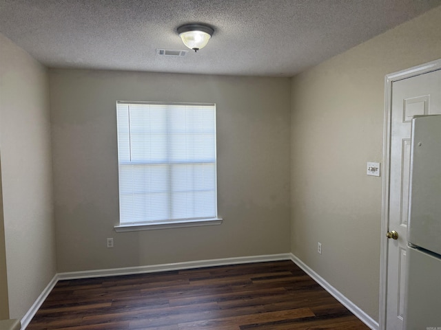 609 Scenic Vly, Heber Springs, AR 72543 - empty room featuring wood finished floors and a textured ceiling