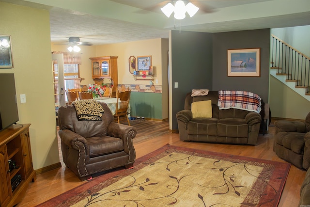 85 Linder Rd, Greenbrier, AR 72058 - living room with a ceiling fan, wood finished floors, and stairs