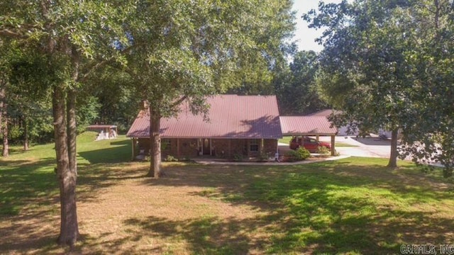 85 Linder Rd, Greenbrier, AR 72058 - rear view of house featuring a yard and a metal roof