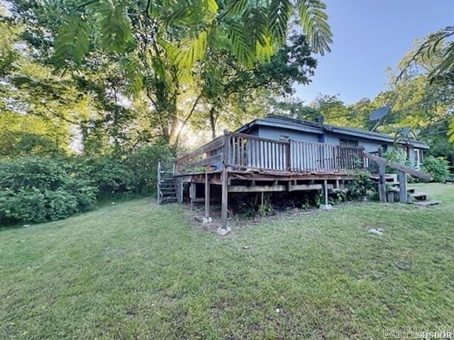 6430 Park Ave, Hot Springs, AR 71901 - rear view of property featuring a yard, a wooden deck, and stairs