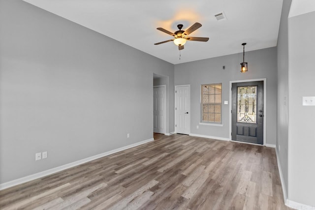 2002 Reagan Cv, Alexander, AR 72002 - foyer featuring a ceiling fan and wood finished floors