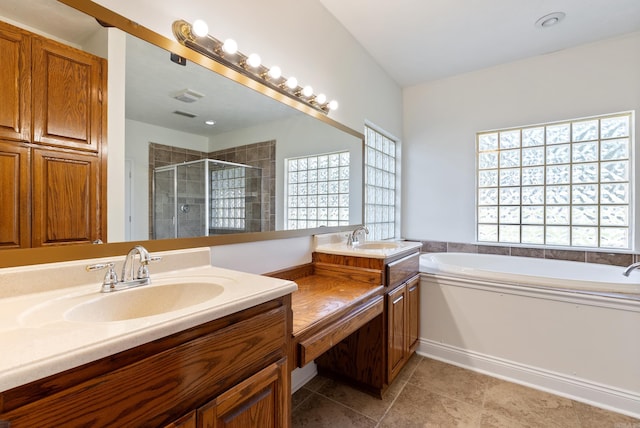 930 Enderlin, Conway, AR 72034 - bathroom featuring vanity, a stall shower, a garden tub, and tile patterned floors