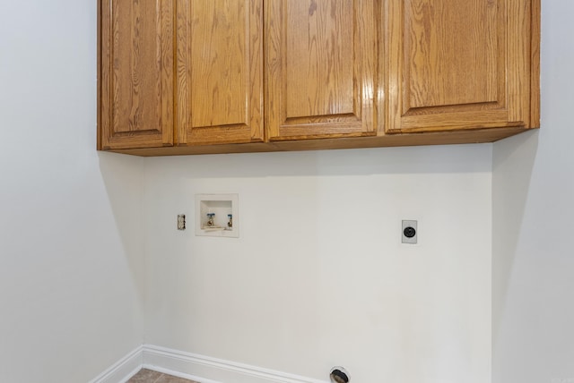 930 Enderlin, Conway, AR 72034 - laundry area featuring hookup for a washing machine, hookup for an electric dryer, and cabinet space