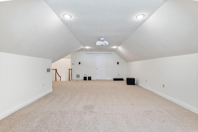 930 Enderlin, Conway, AR 72034 - additional living space featuring carpet floors, lofted ceiling, and recessed lighting