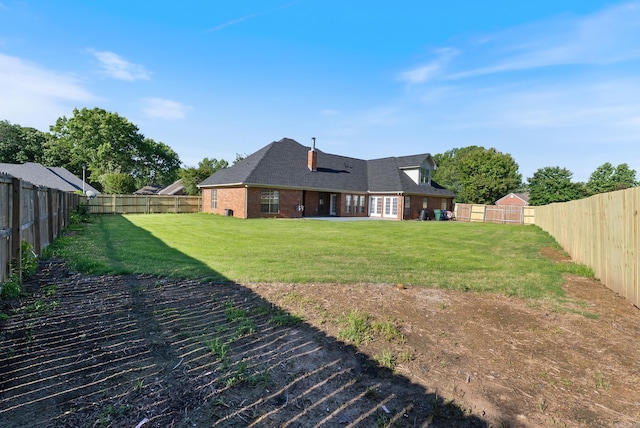 930 Enderlin, Conway, AR 72034 - back of property with brick siding and a fenced backyard