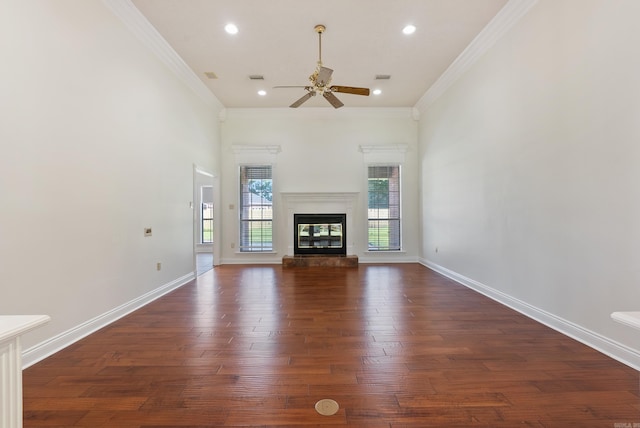 930 Enderlin, Conway, AR 72034 - unfurnished living room with ceiling fan, dark wood-type flooring, recessed lighting, crown molding, and a glass covered fireplace