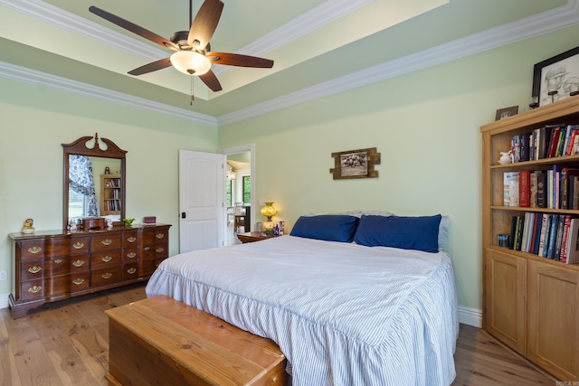 13518 Pikes Peak Pl, Rogers, AR 72756 - bedroom featuring crown molding, wood finished floors, and a ceiling fan