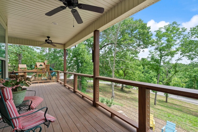 13518 Pikes Peak Pl, Rogers, AR 72756 - wooden terrace featuring ceiling fan and a playground