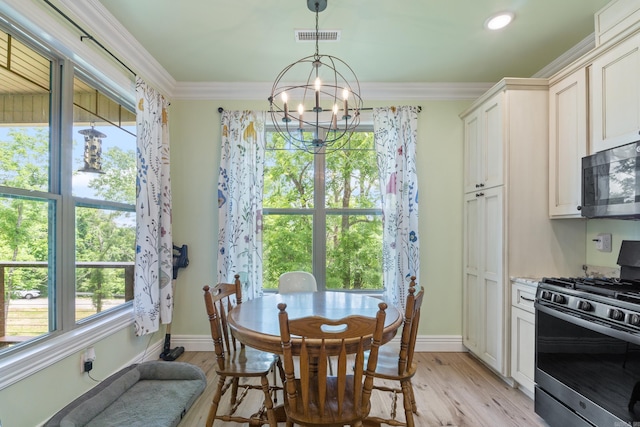 13518 Pikes Peak Pl, Rogers, AR 72756 - dining space with a chandelier, plenty of natural light, light wood finished floors, and ornamental molding