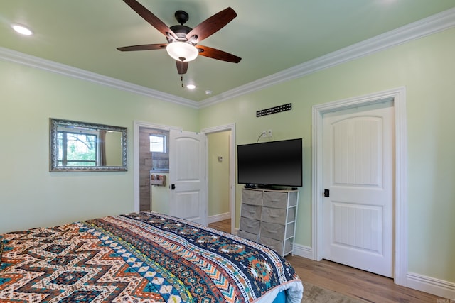 13518 Pikes Peak Pl, Rogers, AR 72756 - bedroom with ornamental molding, wood finished floors, ceiling fan, and recessed lighting
